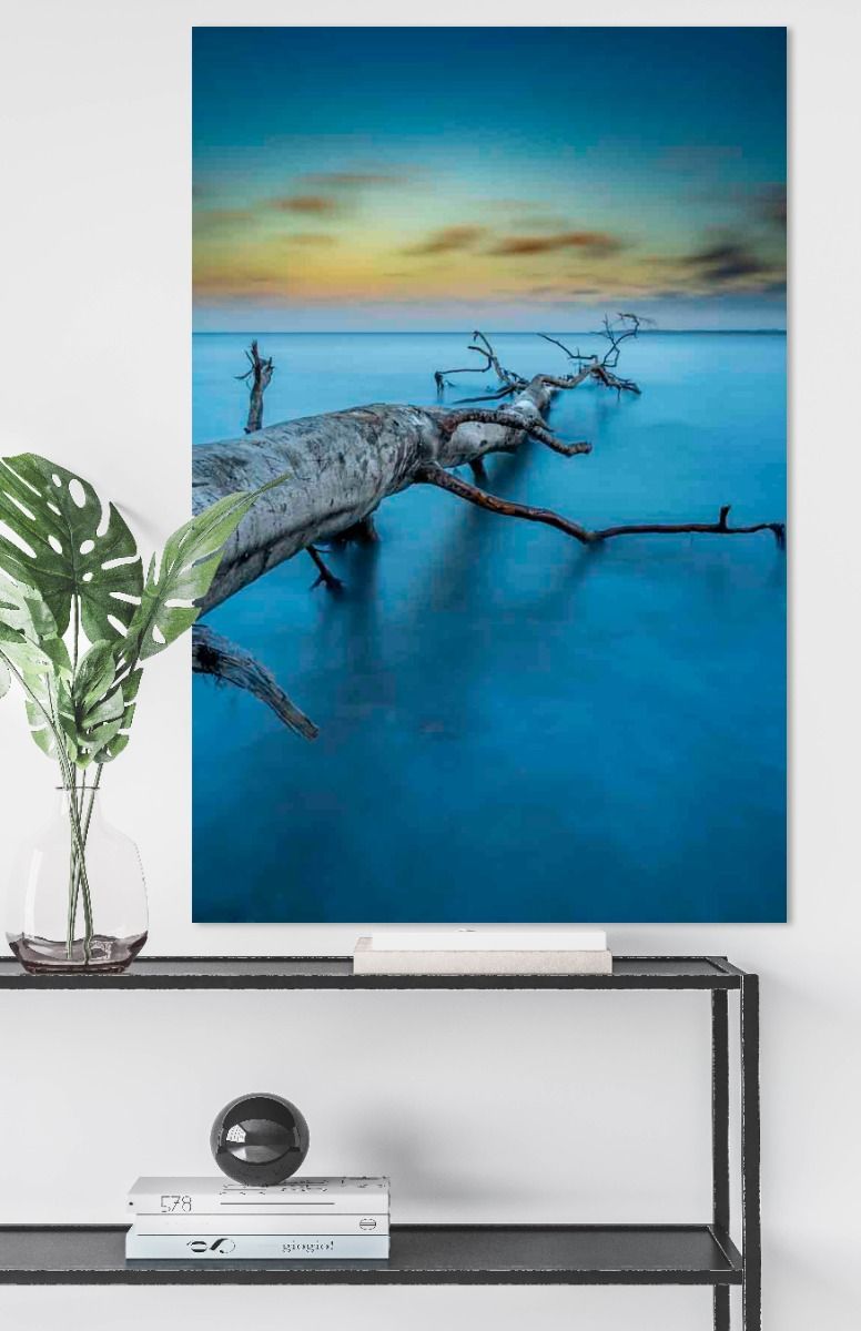 schilderij van een meer bij zonsondergang